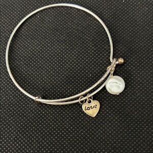 Custom wire wrap bracelet. Adjustable with spring opening.